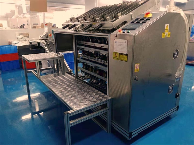 Stainless steel automatic production machine standing on the cleanroom floor